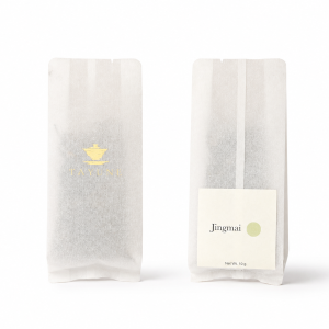Front and back of a labelled 10 g Jingmai Pu-erh tea sample sachet